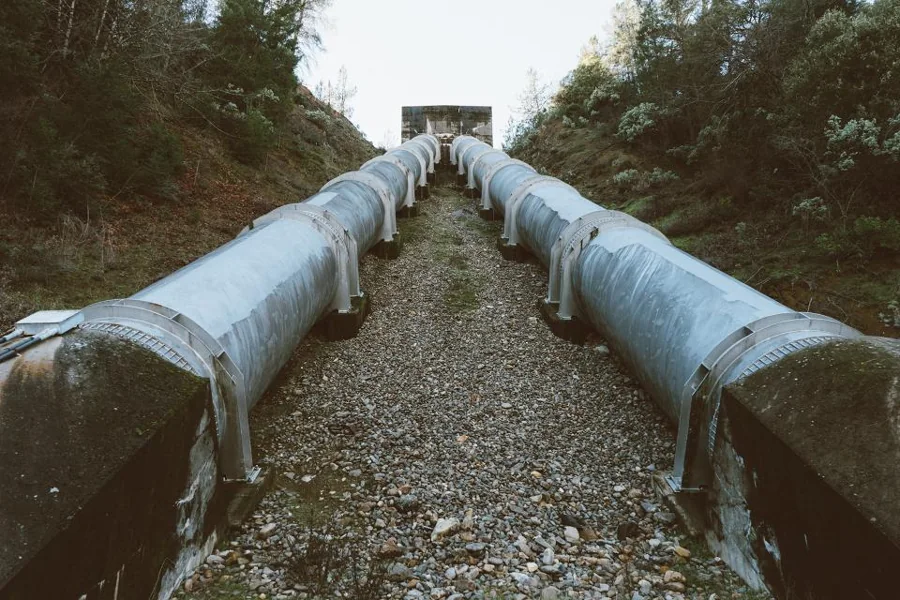 A pipeline running along a rocky channel